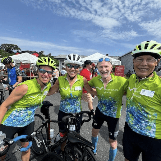 Team South Shore Health riders Laura Bicknell Carbone, Kathleen Oliver, Rich Chamberlain, and Len Bicknell during PMC weekend in 2024.